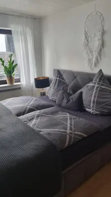 Ein Bett oder Betten in einem Zimmer der Unterkunft 2-Zimmer Wohnung 80qm bis 4Pers.