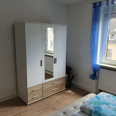 Ein Bett oder Betten in einem Zimmer der Unterkunft Ferienwohnung Nina