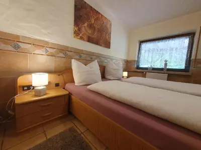 Ein Bett oder Betten in einem Zimmer der Unterkunft Ferienwohnung Moselglück