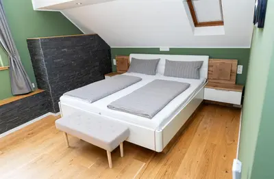 Ein Bett oder Betten in einem Zimmer der Unterkunft Ferienwohnung Mosel-Saar-Ruwer