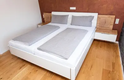Ein Bett oder Betten in einem Zimmer der Unterkunft Ferienwohnung Mosel-Saar-Ruwer