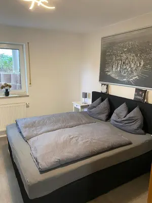 Ein Bett oder Betten in einem Zimmer der Unterkunft Apartment im Grünen bei Koblenz