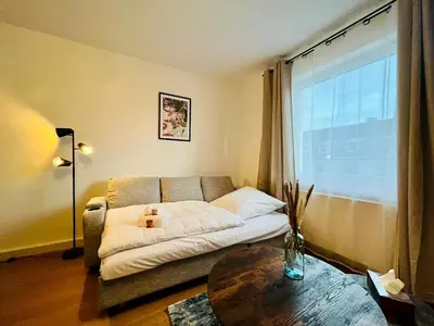 Ein Bett oder Betten in einem Zimmer der Unterkunft Immo-Vision Komfort & Entspannung Koblenz-Hauptbahnhof-Zentral