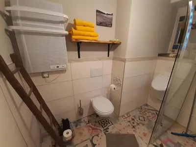 Ein Badezimmer in der Unterkunft Ferienwohnung Anno1880
