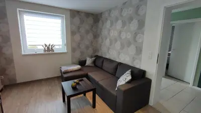 Ein Sitzbereich in der Unterkunft Kleine Auszeit - Ferienwohnung Heideberg - 
