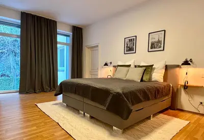 Ein Bett oder Betten in einem Zimmer der Unterkunft VonMos City Apartments