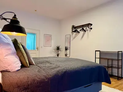Ein Bett oder Betten in einem Zimmer der Unterkunft VonMos City Apartments