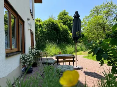 Ein Garten an der Unterkunft Ferienwohnung im Moselland