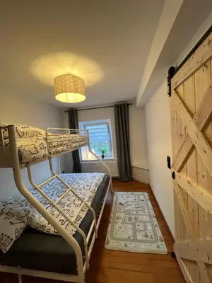 Ein Bett oder Betten in einem Zimmer der Unterkunft Casa Eifel