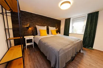 Ein Bett oder Betten in einem Zimmer der Unterkunft Casa Eifel