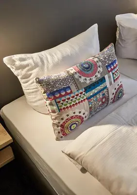 Ein Bett oder Betten in einem Zimmer der Unterkunft Gästehaus Zur Traube