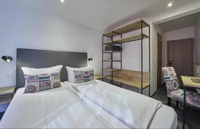 Ein Bett oder Betten in einem Zimmer der Unterkunft Gästehaus Zur Traube