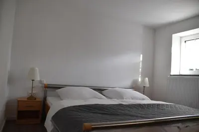 Ein Bett oder Betten in einem Zimmer der Unterkunft Ferienwohnung-Naurath