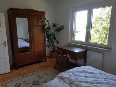 Ein Bett oder Betten in einem Zimmer der Unterkunft Ferienwohnung Alte-Schule-Kail Wohnung 2