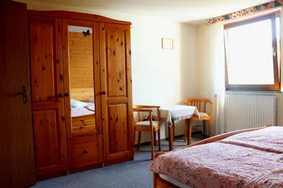 Ein Bett oder Betten in einem Zimmer der Unterkunft Haus Brückenblick
