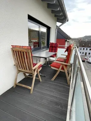 Ein Balkon oder eine Terrasse in der Unterkunft Ferienwohnung '' Wein unter Palmen ''