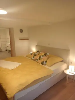 Ein Bett oder Betten in einem Zimmer der Unterkunft Stübchen
