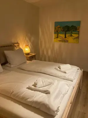 Ein Bett oder Betten in einem Zimmer der Unterkunft Römerlager