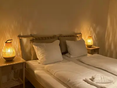 Ein Bett oder Betten in einem Zimmer der Unterkunft Römerlager