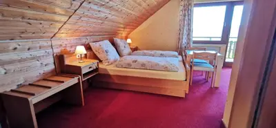 Ein Bett oder Betten in einem Zimmer der Unterkunft Apartment mit Balkon