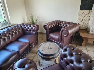 Ein Sitzbereich in der Unterkunft Western Cottage Hocheifel