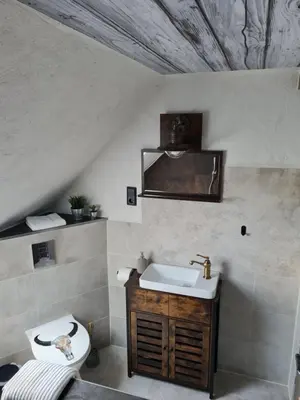 Ein Badezimmer in der Unterkunft Western Cottage Hocheifel