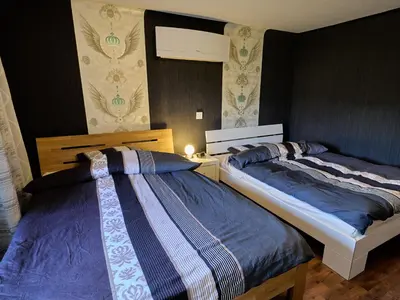 Ein Bett oder Betten in einem Zimmer der Unterkunft Ferienwohnung Grüner Flamingo