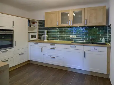Küche/Küchenzeile in der Unterkunft Ferienwohnung Grüner Flamingo