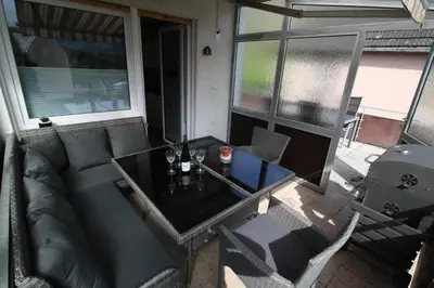 Ein Sitzbereich in der Unterkunft Komfort Ferienwohnung FEWO 74-3