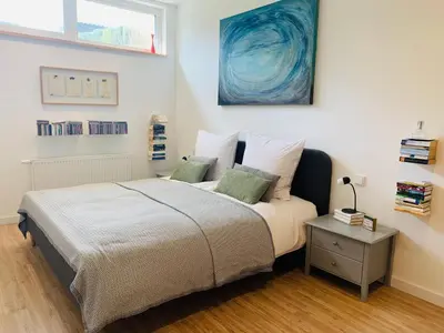 Ein Bett oder Betten in einem Zimmer der Unterkunft Ferienhaus Sonnenaufgang