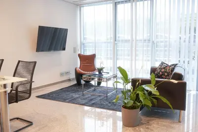 Ein Sitzbereich in der Unterkunft Exklusive Stadtoase Design·Wohnung · Panoramablick