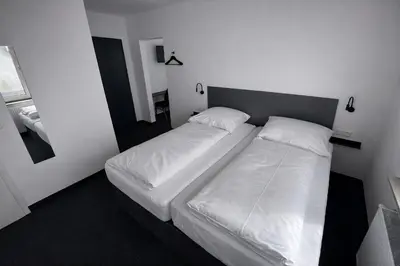 Ein Bett oder Betten in einem Zimmer der Unterkunft Zzzimple - Self Check-In