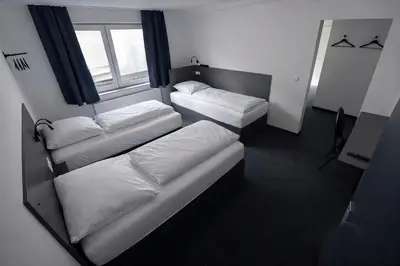 Ein Bett oder Betten in einem Zimmer der Unterkunft Zzzimple - Self Check-In